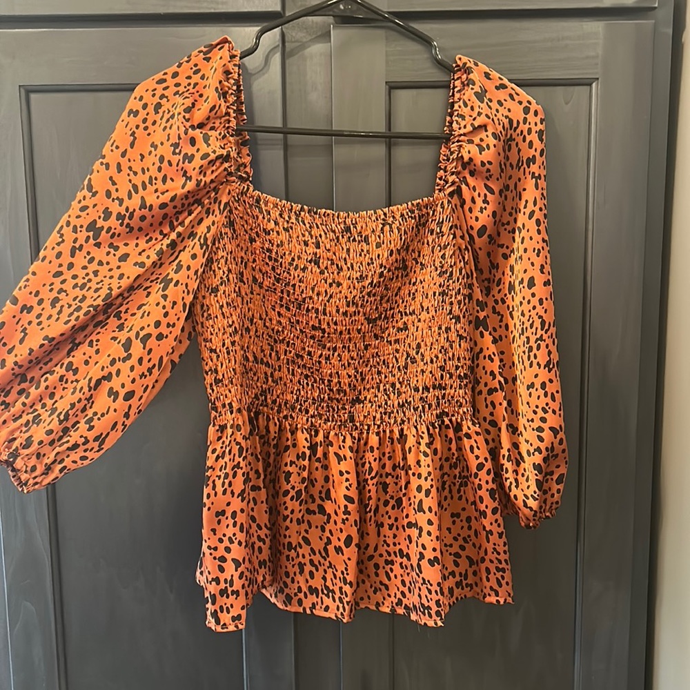NWT women’s animal print blouse